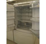 The fridge has adjustable shelves, door bins and dairy bins, as well as temperature- and humidity-controlled drawers.